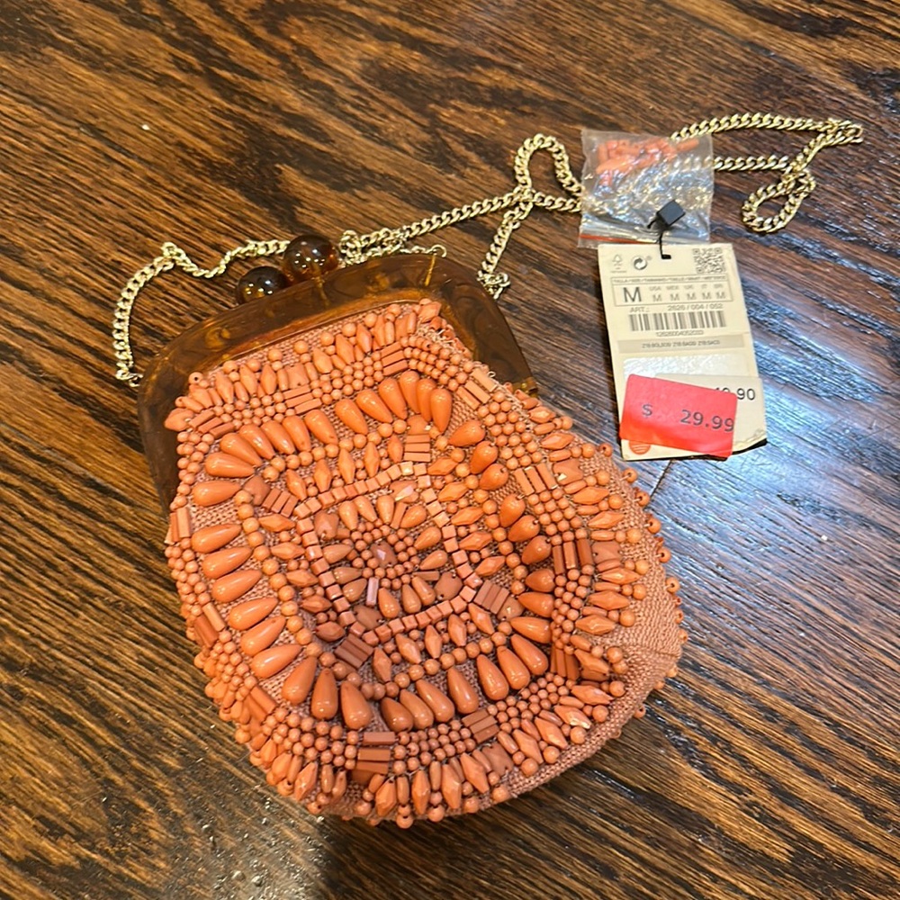 Brand new Zara purse / clutch. Beaded with chain in coral / salmon color